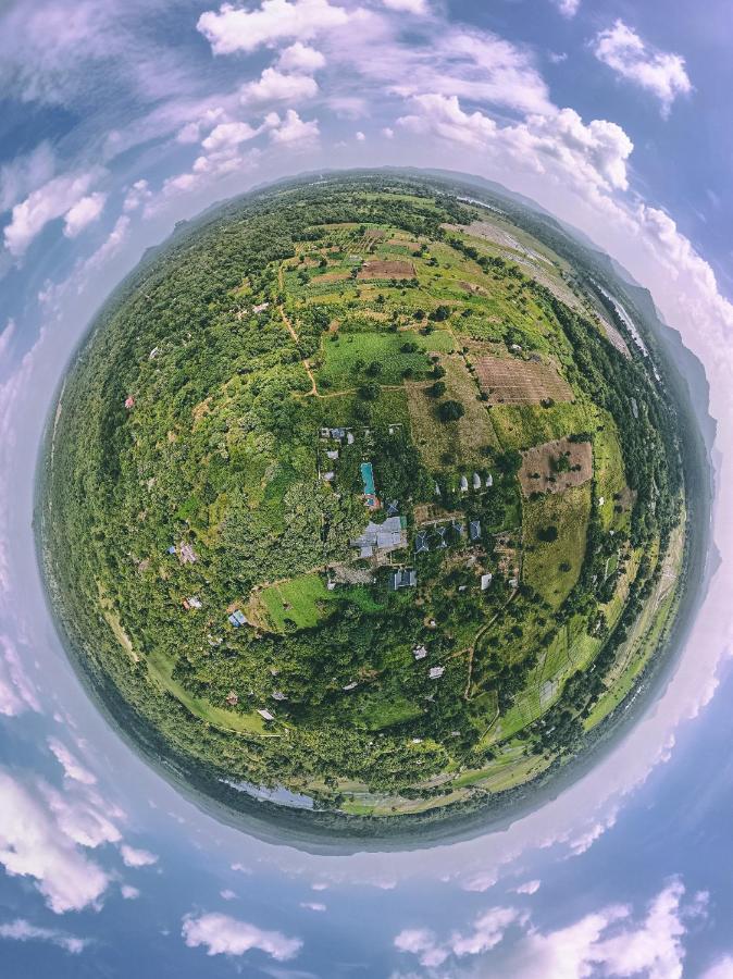 Nivadoo Resort Sigiriya Buitenkant foto Aerial view of the village
